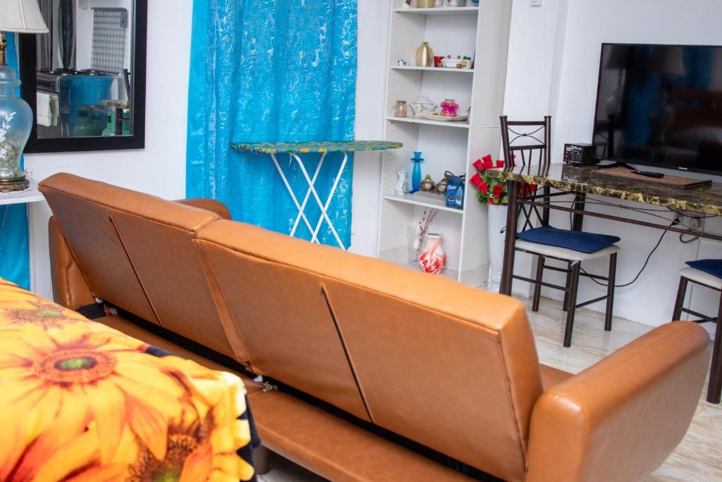 TV a/nebo společenská místnost v ubytování PRI Studio Apartment