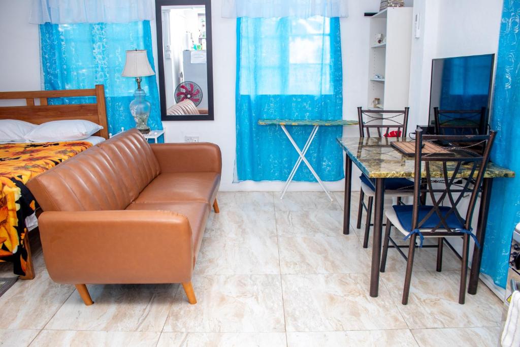 Postel nebo postele na pokoji v ubytování PRI Studio Apartment