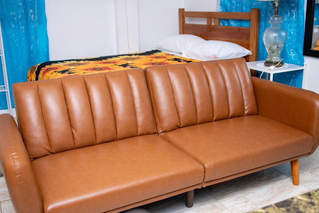 Postel nebo postele na pokoji v ubytování PRI Studio Apartment