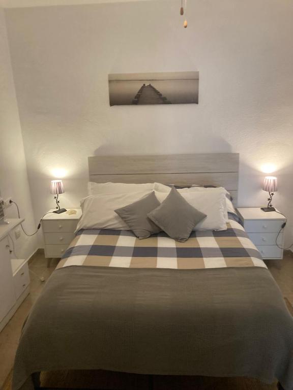 Postel nebo postele na pokoji v ubytování Marina Apartment Beach