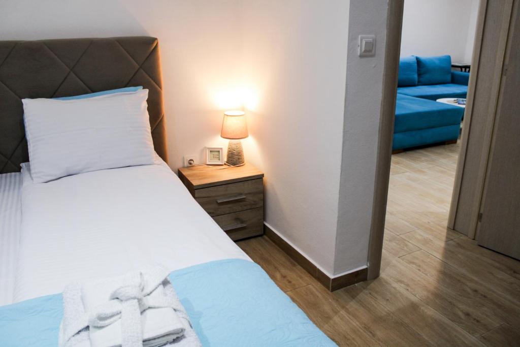 Postel nebo postele na pokoji v ubytování Apartment Stojanovic