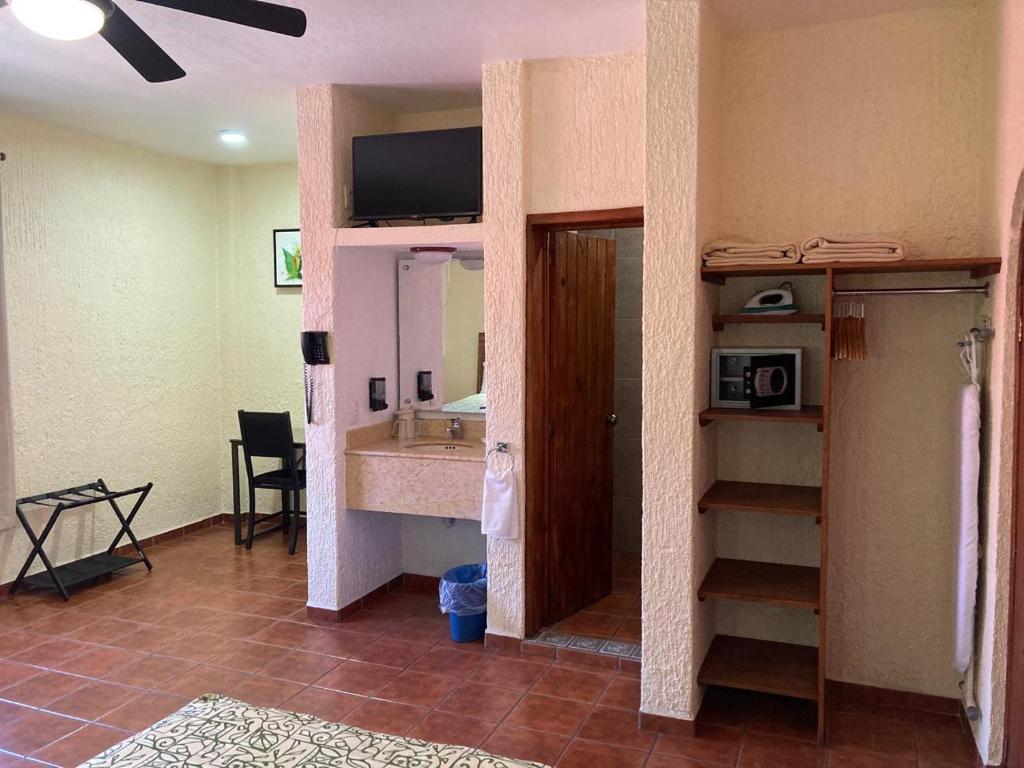 Kuchyň nebo kuchyňský kout v ubytování HOTEL CASA DE LAS PALOMAS