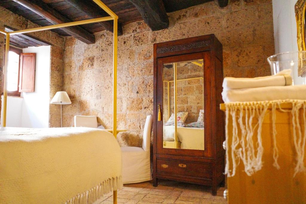 Postel nebo postele na pokoji v ubytování Case di Civita