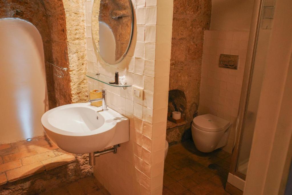 Koupelna v ubytování Case di Civita