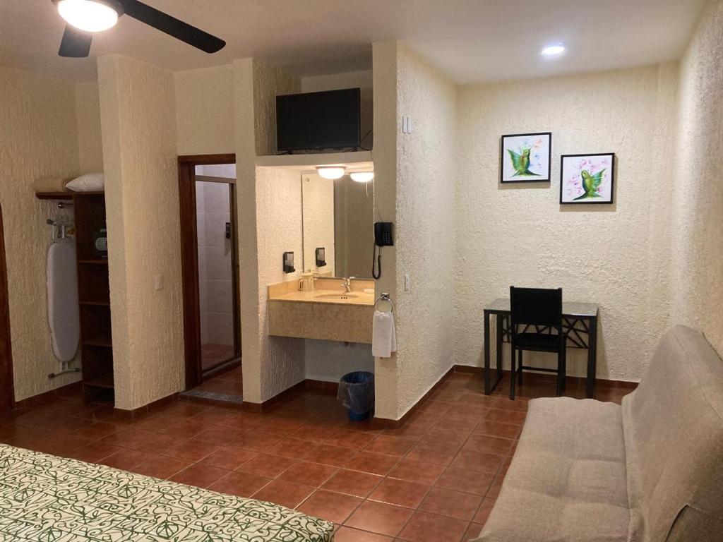 Kuchyň nebo kuchyňský kout v ubytování HOTEL CASA DE LAS PALOMAS