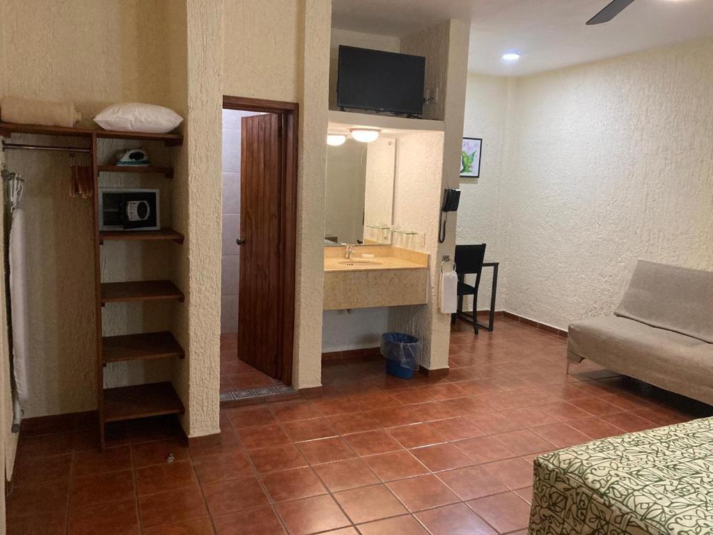 Kuchyň nebo kuchyňský kout v ubytování HOTEL CASA DE LAS PALOMAS
