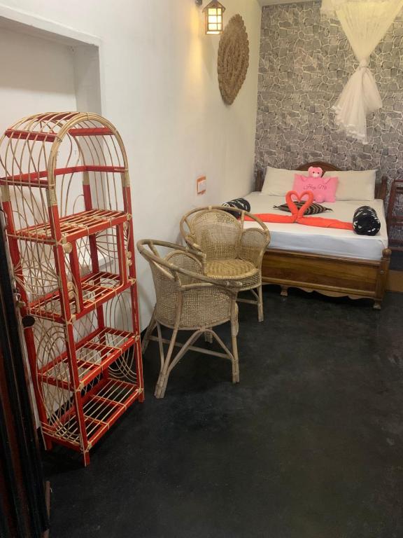 Postel nebo postele na pokoji v ubytování Cane Homestay
