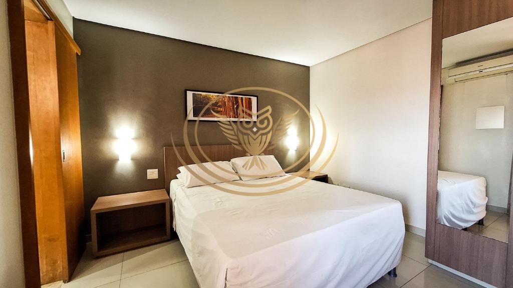 Postel nebo postele na pokoji v ubytování Coruja Imob - Flat Crystal Place