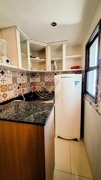 Kuchyň nebo kuchyňský kout v ubytování Coruja Imob - Flat Crystal Place