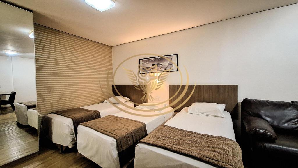 Postel nebo postele na pokoji v ubytování Coruja Imob - Flat Crystal Place