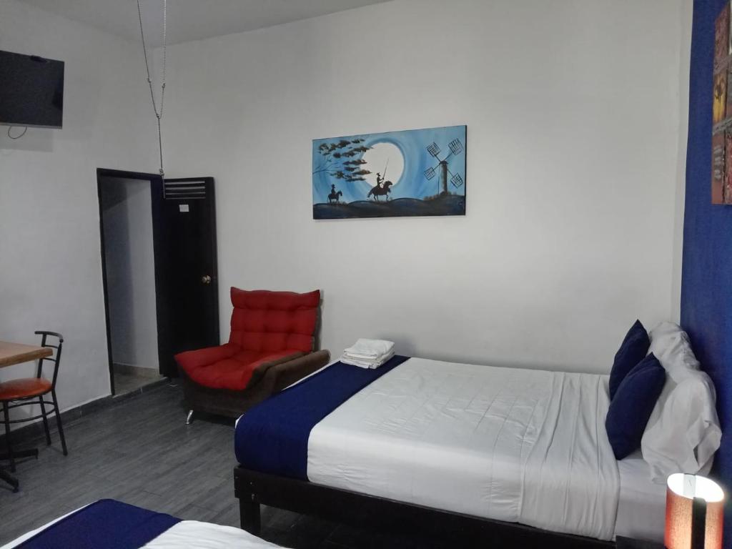 Postel nebo postele na pokoji v ubytování Hotel Gandag