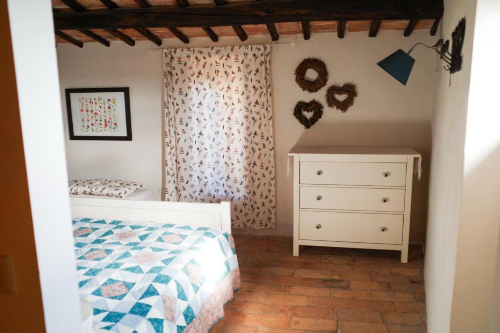 Postel nebo postele na pokoji v ubytování Case di Civita