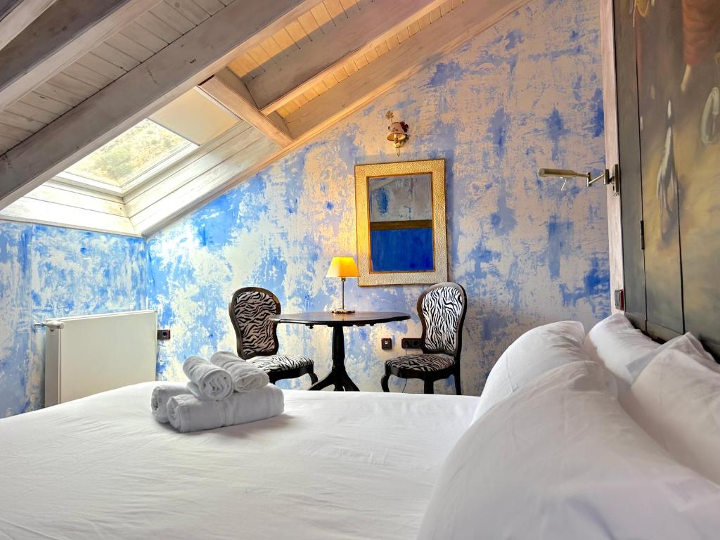 Voodi või voodid majutusasutuse La Posada d'Àneu by RdA Hotels toas