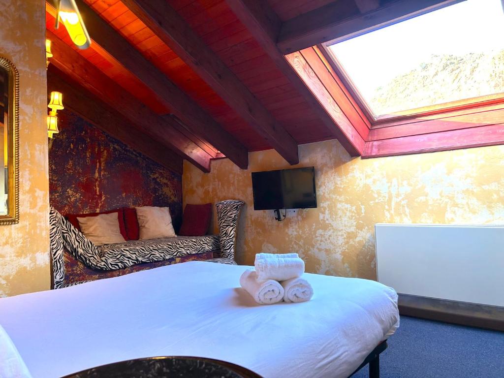 Voodi või voodid majutusasutuse La Posada d'Àneu by RdA Hotels toas
