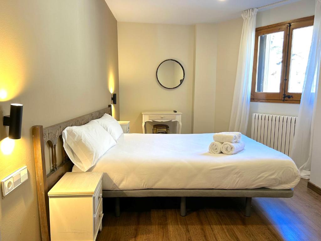 Voodi või voodid majutusasutuse La Posada d'Àneu by RdA Hotels toas