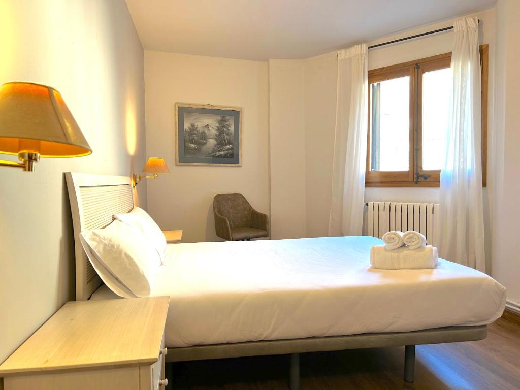 Voodi või voodid majutusasutuse La Posada d'Àneu by RdA Hotels toas