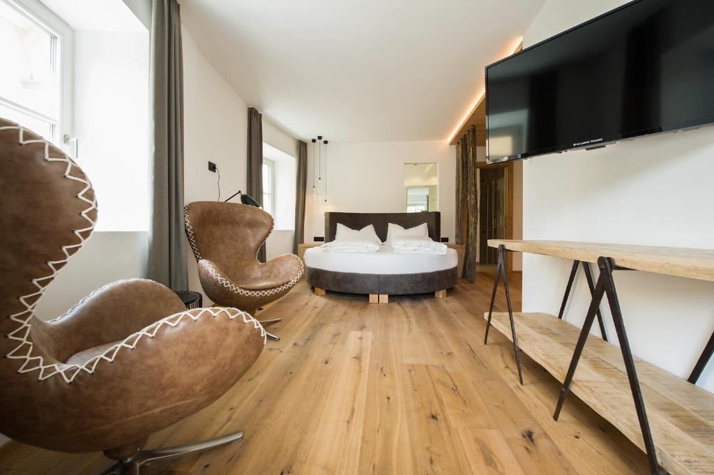 Postel nebo postele na pokoji v ubytování Hotel Goldene Traube