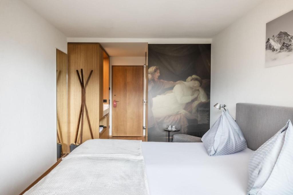 Postel nebo postele na pokoji v ubytování Panoramahotel Sonnhalde