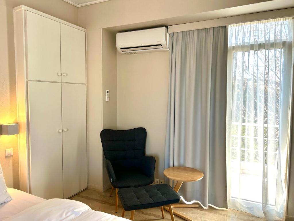 Postel nebo postele na pokoji v ubytování Loriet Hotel