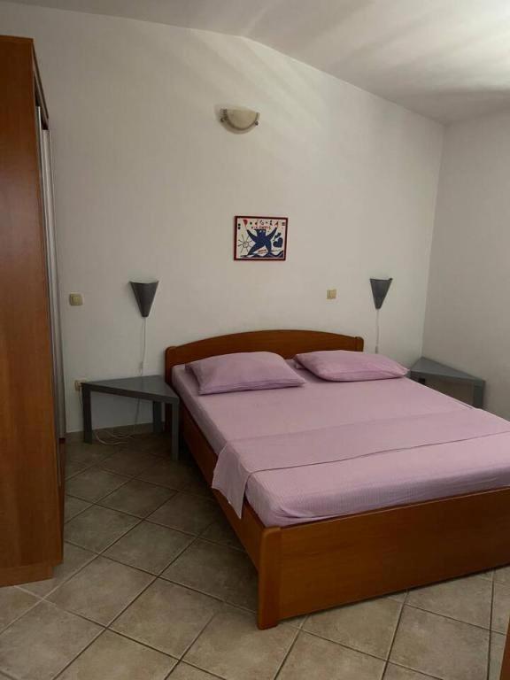 Posteľ alebo postele v izbe v ubytovaní Apartment in Podgora with sea view, terrace, air conditioning, WiFi 3812-4