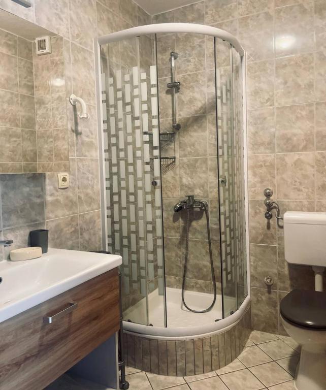 Kúpeľňa v ubytovaní Apartment in Podgora with sea view, terrace, air conditioning, WiFi 3812-3