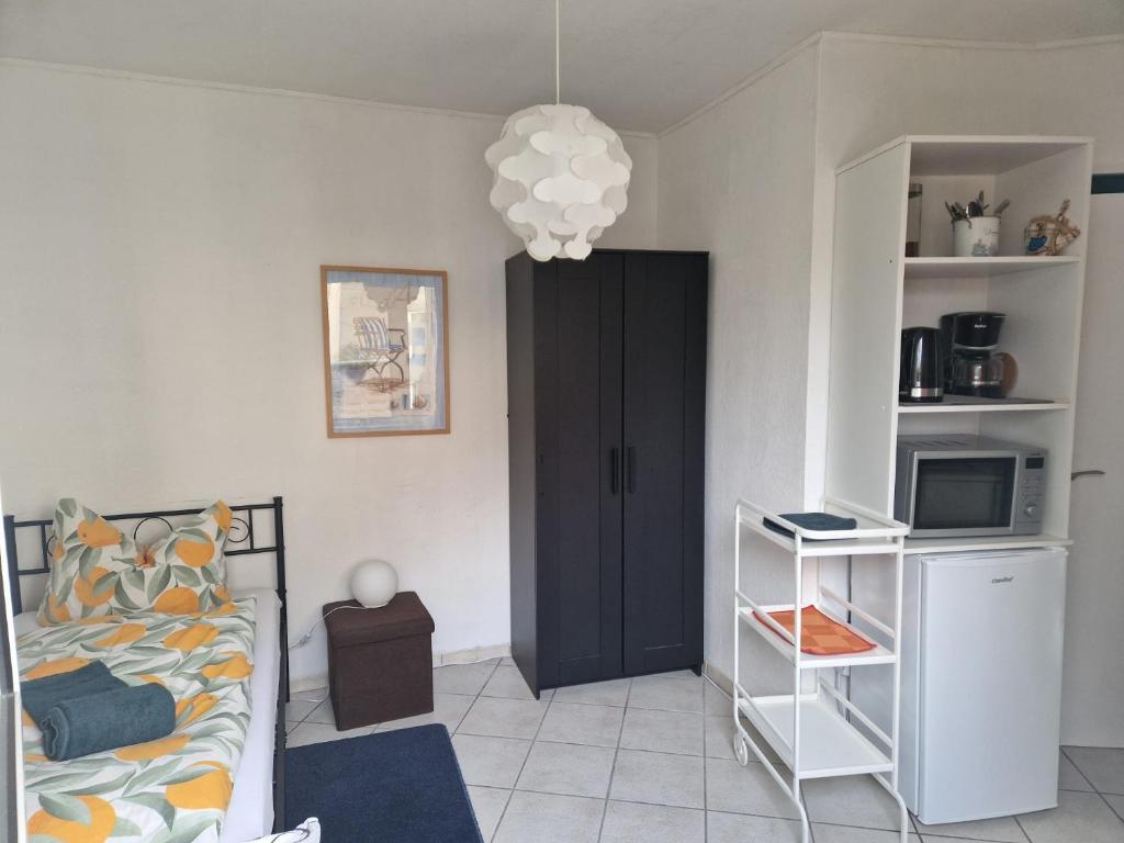 Η κουζίνα ή μικρή κουζίνα στο Erdgeschoss kleine Apartament