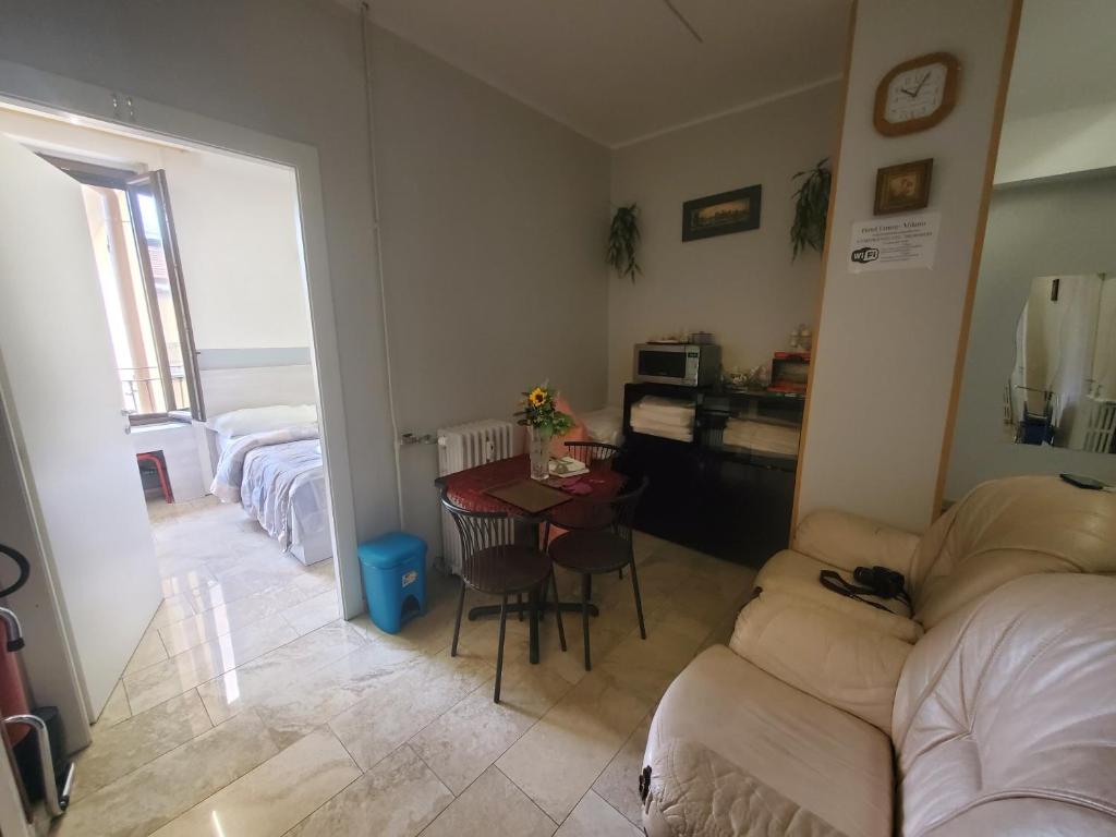 Łóżko lub łóżka w pokoju w obiekcie Hotel Emmy