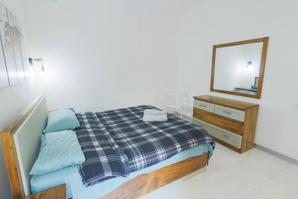 Postel nebo postele na pokoji v ubytování Fort Chambray, Blissful Escape