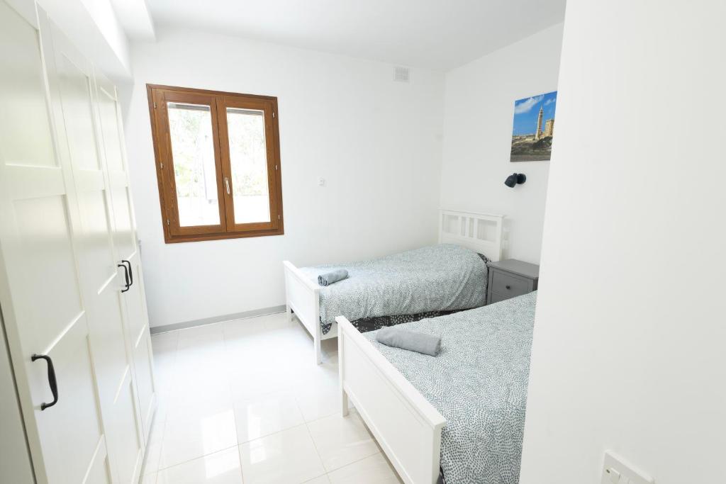 Postel nebo postele na pokoji v ubytování Fort Chambray, Blissful Escape