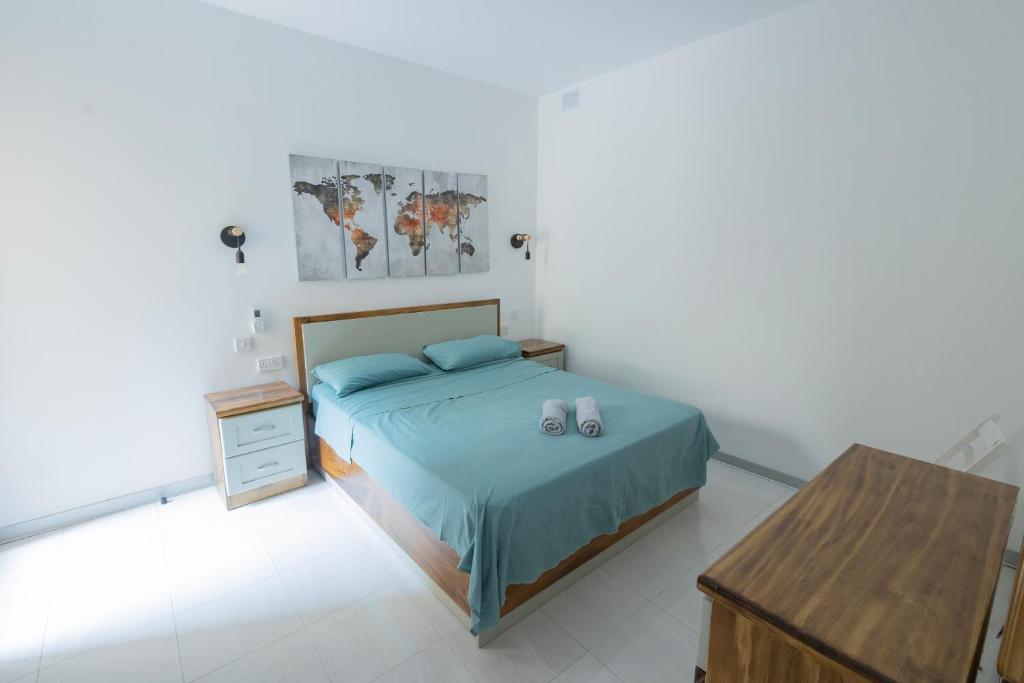 Postel nebo postele na pokoji v ubytování Fort Chambray, Blissful Escape