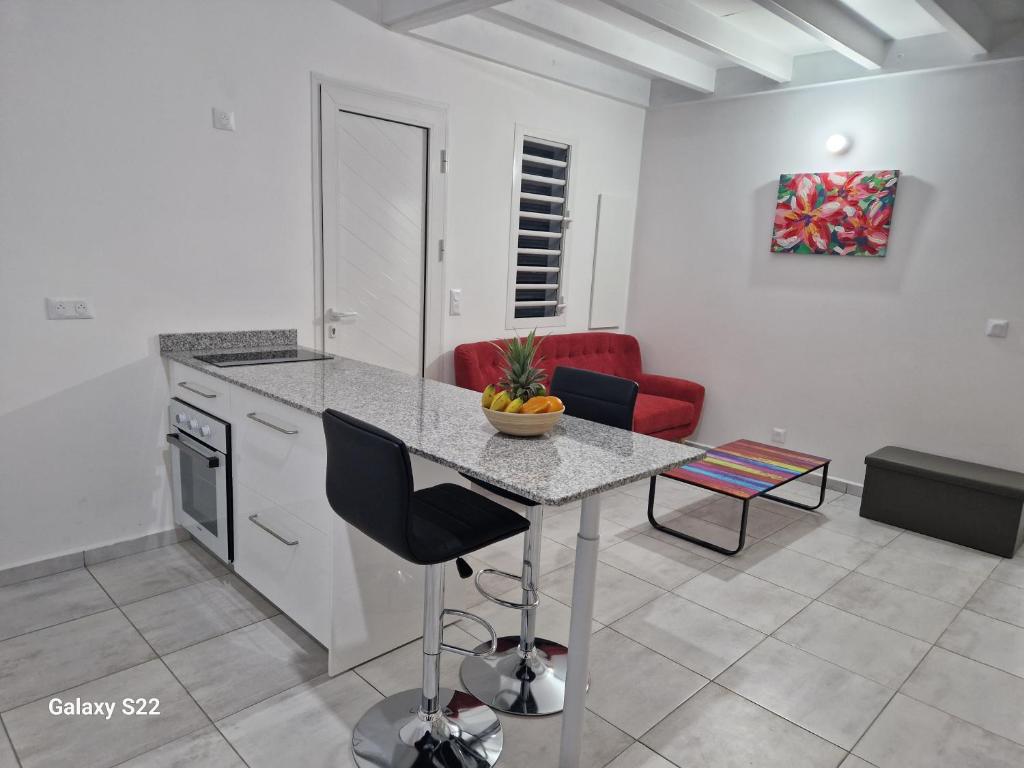 Kuchyň nebo kuchyňský kout v ubytování Villa COEUR KERA