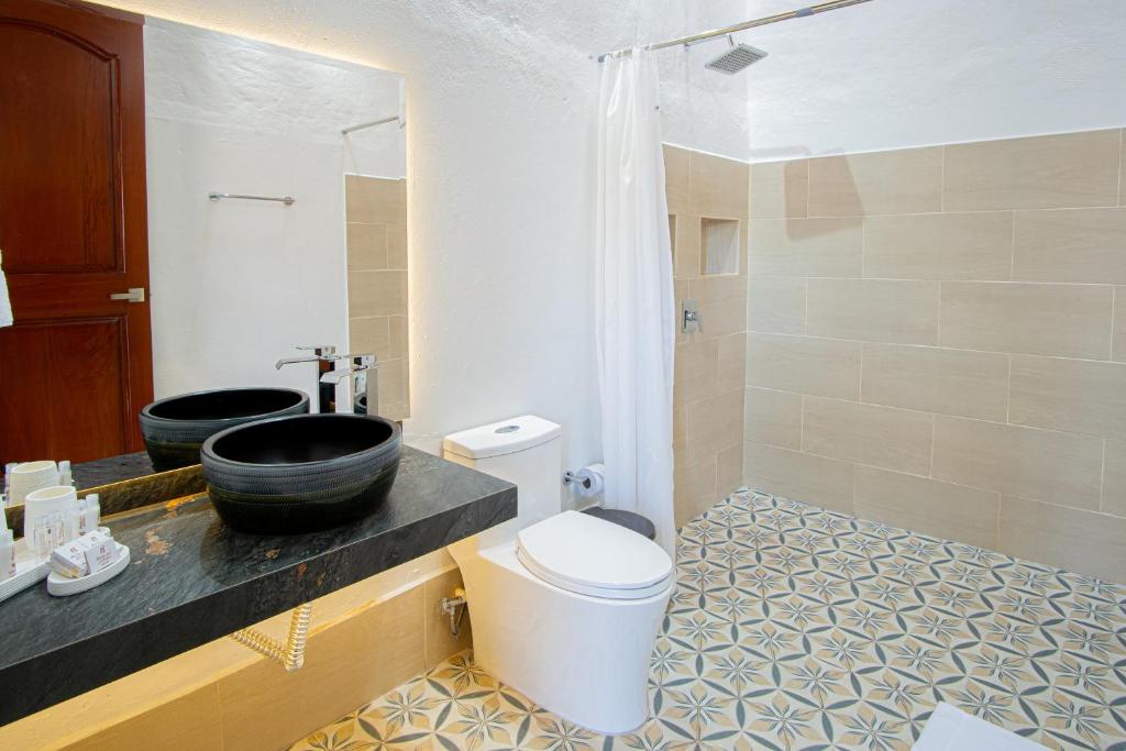 Koupelna v ubytování Hotel Hicasua y Centro de Convenciones