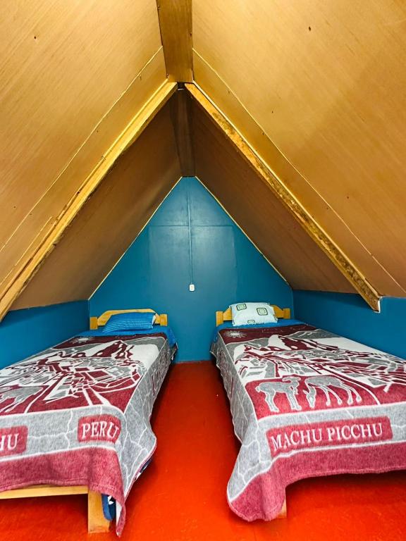 Postel nebo postele na pokoji v ubytování Salkantay Lodge Collpapampa