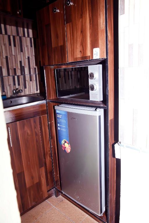 Kuchyň nebo kuchyňský kout v ubytování Sunshine Place S4