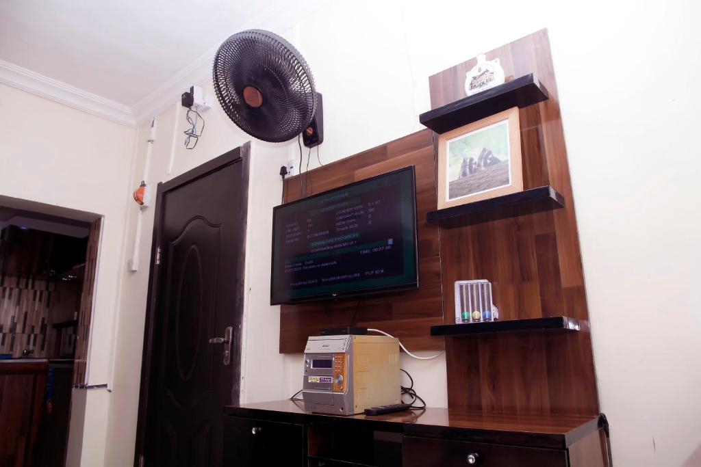 TV a/nebo společenská místnost v ubytování Sunshine Place S4