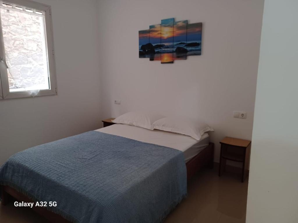 Postel nebo postele na pokoji v ubytování Casa Larinha