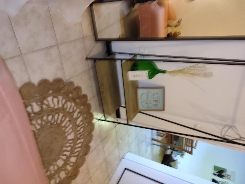 a refrigerator with a fan in a room at Marques House in Machico