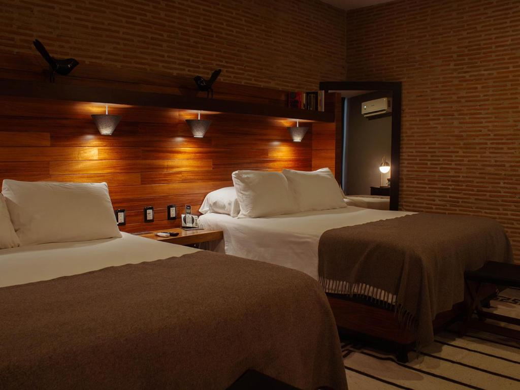 Postel nebo postele na pokoji v ubytování Elena de Cobre, Leon, a Member of Design Hotels