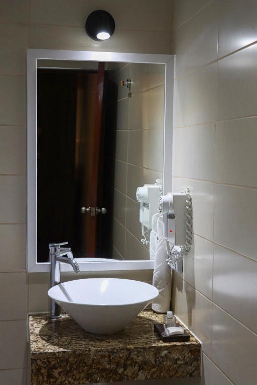 Koupelna v ubytování Rado Hotel - Quintanas