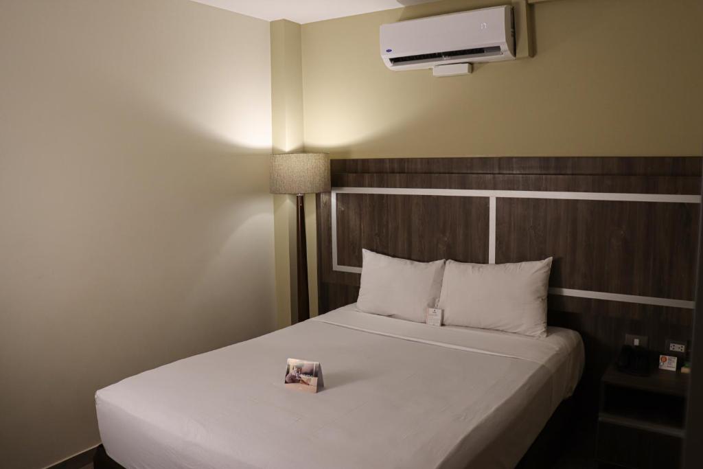 Postel nebo postele na pokoji v ubytování Rado Hotel - Quintanas
