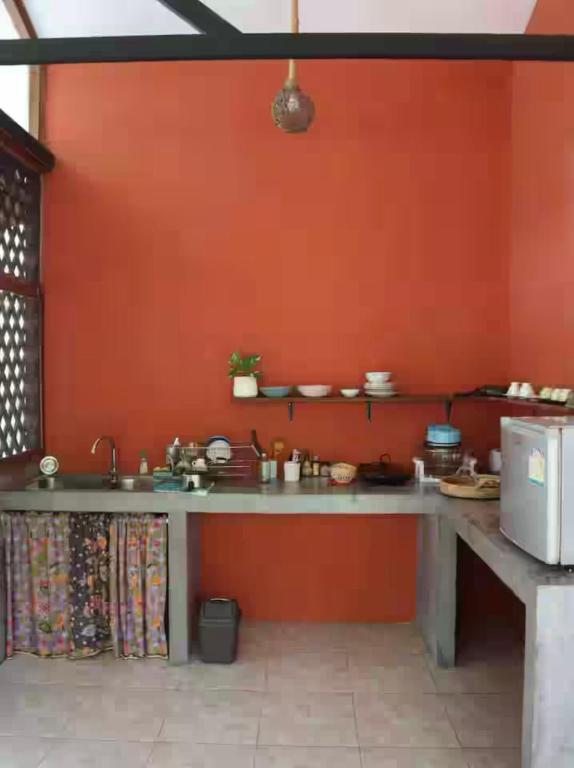 Kuchyň nebo kuchyňský kout v ubytování CocoHut Guesthouse