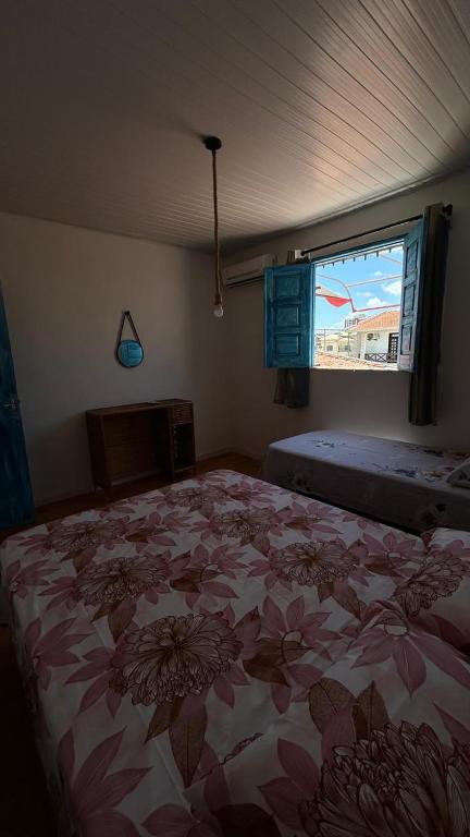Postel nebo postele na pokoji v ubytování Sequência Surf Paradise HOSTEL E POUSADA