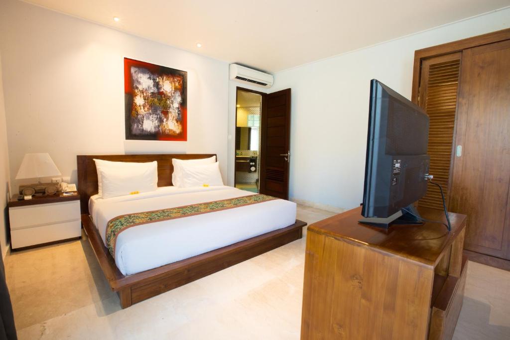 Postel nebo postele na pokoji v ubytování Ubud Wana Resort