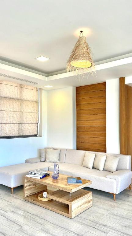 Posezení v ubytování Penthouse Hôtholrie vue mer avec piscine A Gammarth Touristique