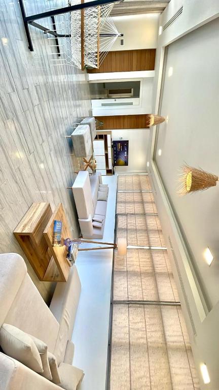 Posezení v ubytování Penthouse Hôtholrie vue mer avec piscine A Gammarth Touristique