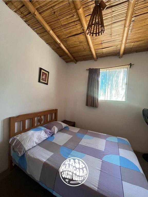 Postel nebo postele na pokoji v ubytování Casa Máncora Guesthouse