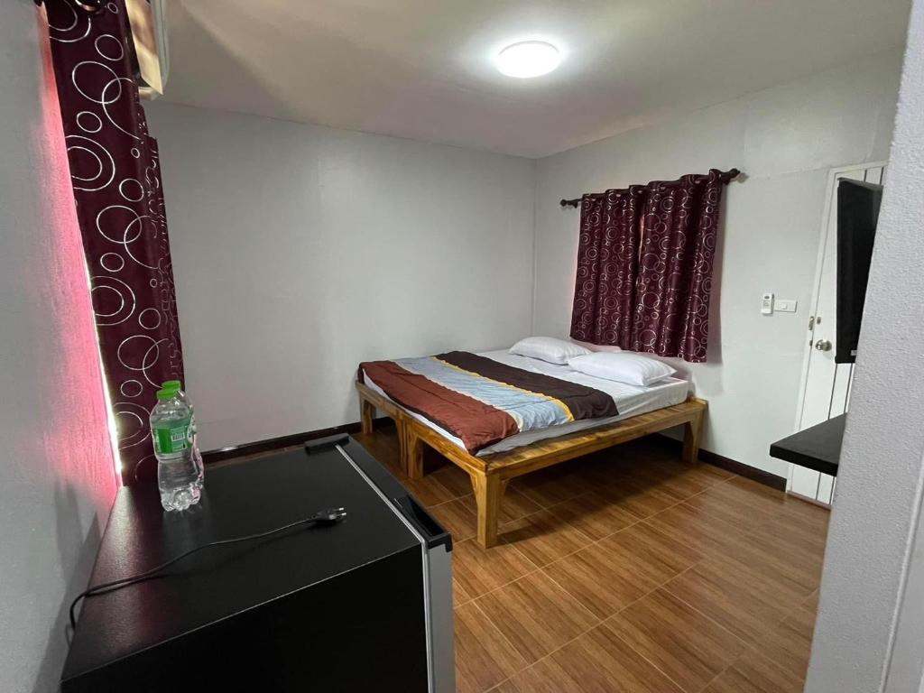 Un pat sau paturi într-o cameră la S&P Huayau Resort รีสอร์ทน้ำอ้อย 2