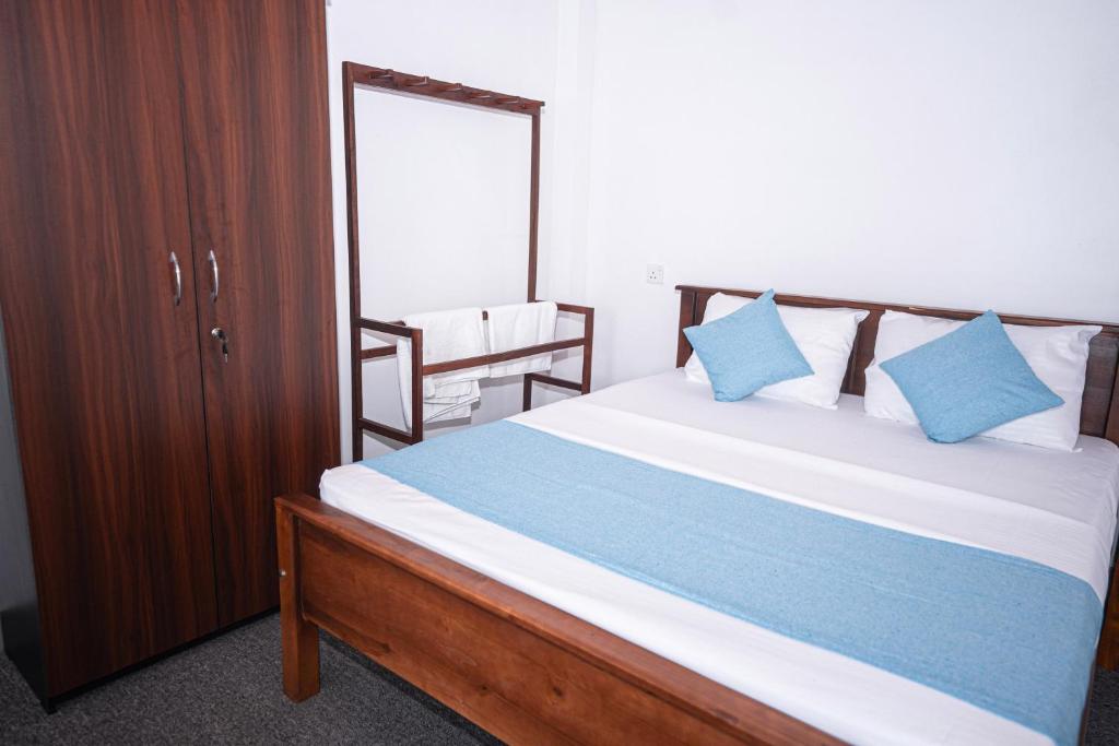 Postel nebo postele na pokoji v ubytování Talalla Breeze