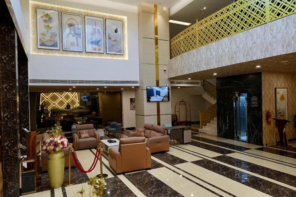 TV a/nebo společenská místnost v ubytování Le Royale Palace