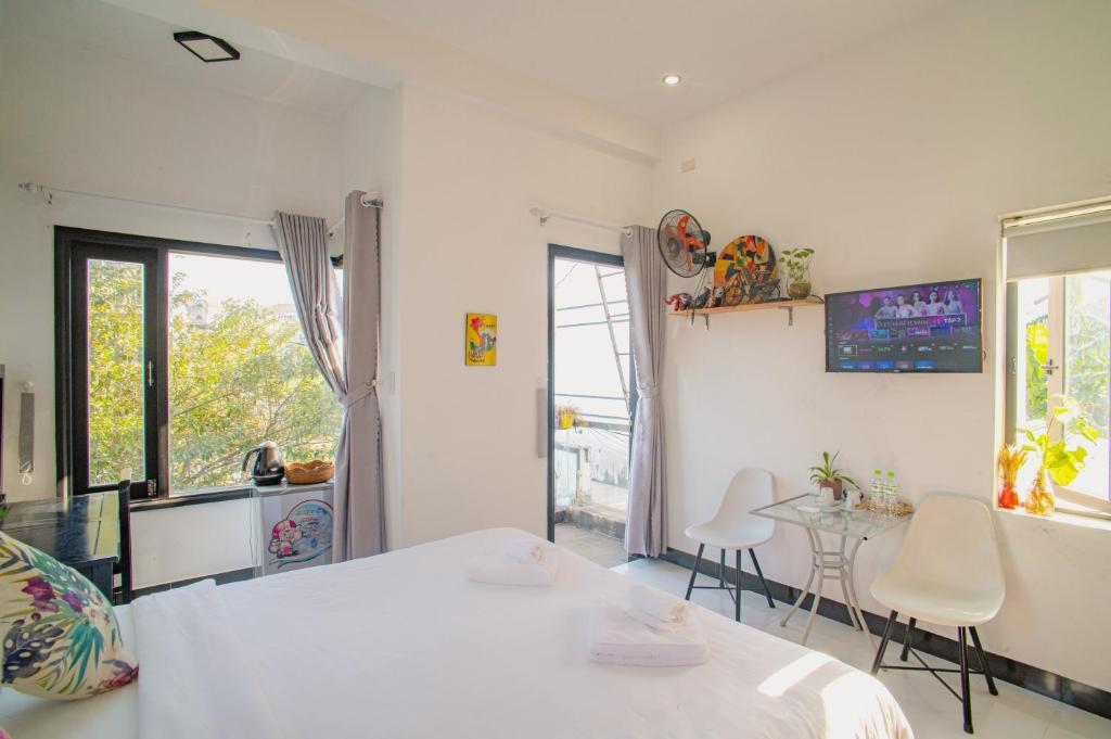 Letto o letti in una camera di Sophia Homestay Hoi An